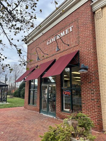 gourmet grocer with one word from its name removed