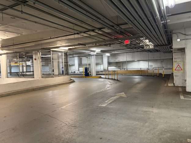 underground garage design at a DC mixed-use supermarket: vehicular damage is inevitable
