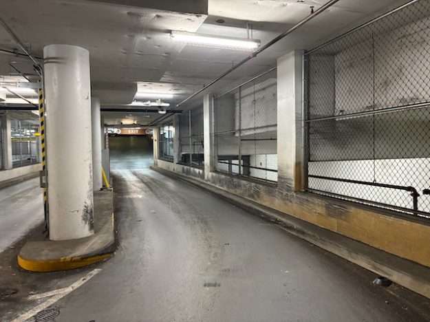 underground garage design at a DC mixed-use supermarket: vehicular damage is inevitable