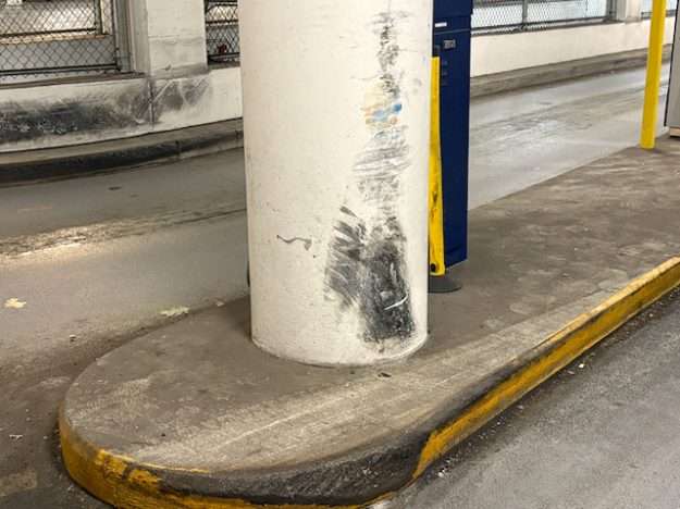 underground garage design at a DC mixed-use supermarket: vehicular damage is inevitable
