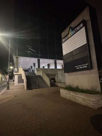 Rosslyn Spectrum: dated logo to a vacant theater